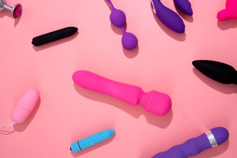 Sex toys on a pink backgound