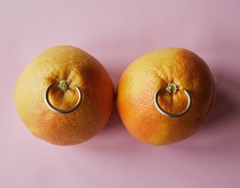 Mandarins with nipple piercing