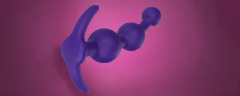 Anal Beads on a Purple Background