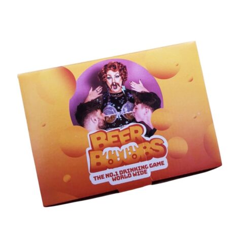 1200557x1jpg Product packaging for a drinking game called 'Beer Bombs' on an orange gradient box with a purple circle and people around drinks.