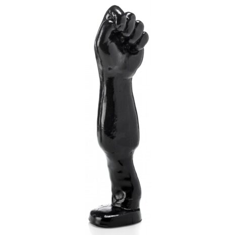 3662811073634x1jpg Black glossy sculpture of a standing leg with a clenched fist at the knee, mounted on a round base.