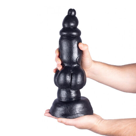 3662811261611x2jpg Large black silicone dildo held upright by two hands against a white background.