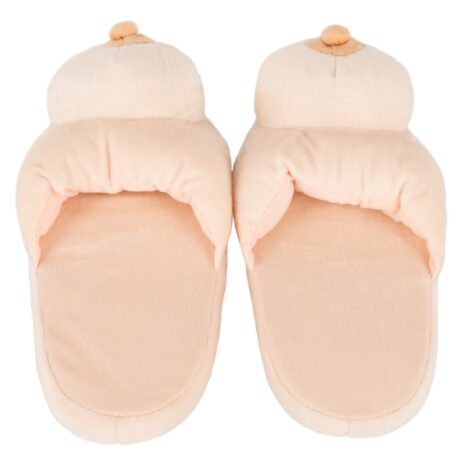 777420x2jpg Soft peach-colored baby booties/slippers made of plush fabric with small top pom-poms, shown side by side