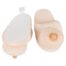 Pair of soft peach plush baby slippers on a white background, with cushioned insoles and fuzzy outer fabric