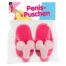 Pair of bright pink fuzzy slippers with cartoonish toe decorations in clear packaging (novelty item labeled 'Penis-Puschen').
