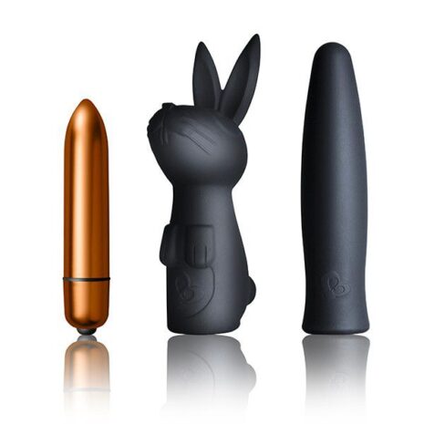 Set of three sex toys: a copper bullet vibrator, a black bunny-shaped vibrator, and a black tapered vibrator.