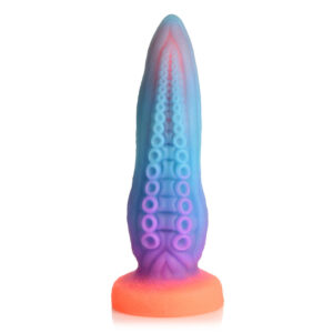 Rainbow gradient silicone dildo with circular ridges along the shaft and an orange suction/base.