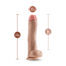 Life-size dildo standing upright with measurements: 11.5 inch length, 2.5 inch diameter, 11 inch insertable.