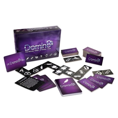 Purple Dominoes game box with scattered domino tiles, instruction cards, and stacked decks on a white background.