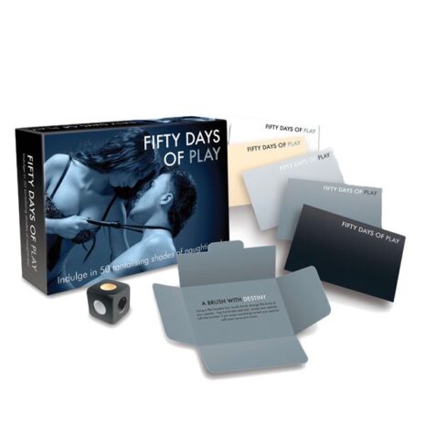 Boxed set of Fifty Days of Play with blue-toned cover, fan of gradient cards, and a small dice nearby.