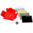 Red open box with 'LAY THE TABLE' text; beside it six 'FIFTY DAYS OF PLAY' cards in white, cream, gray, yellow, olive, and black, plus a small black die.