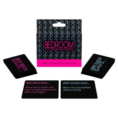 Black card deck labeled Bedroom Commands with pink branding, shown with several risqué message cards arranged around a white backdrop.