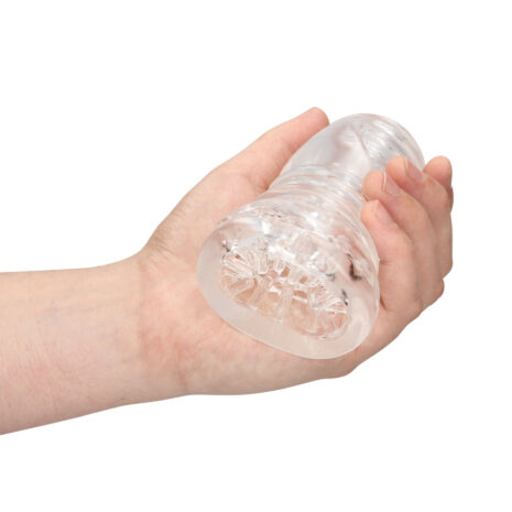 LOVE047x2jpg Clear textured sex toy held in a hand, showing internal ridges.