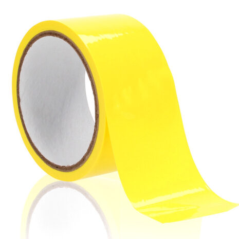 POSOU024x1jpg Yellow packing tape roll with its end pulled out, resting on a white background.