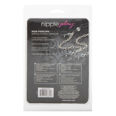 SE-2616-10-2x3jpg Packaging for Nipple Play non-piercing nipple chain jewelry, showing a silver adjustable chain with crystal beads on a dark decorative card with brand name Nippl ePlay (text may be cut). - informative product image