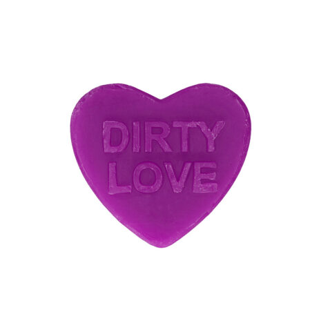 Purple heart-shaped object with the words DIRTY LOVE embossed on it, on a white background.