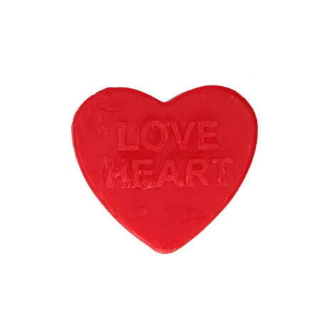 Red heart-shaped object with the words LOVE HEART embossed on it