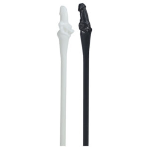 Pair of bone-shaped plastic wands, white and black, with carved figures at the top.