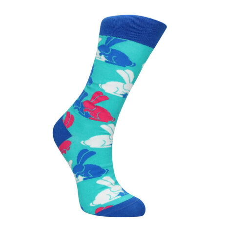 Knee-high sock in turquoise with repeating blue, white, and pink rabbit silhouettes and dark blue cuff, heel, and toe.