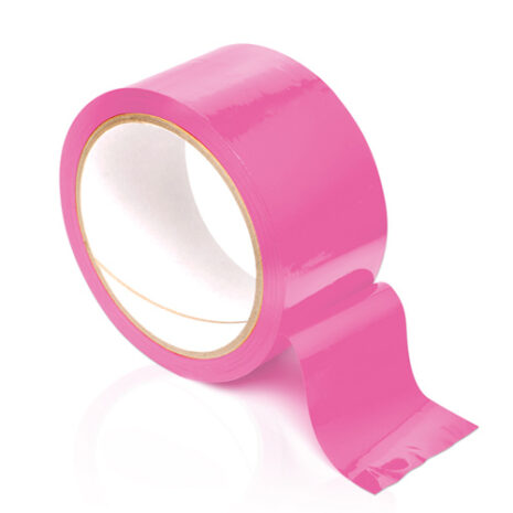 pinktapex1jpg Pink adhesive tape roll with a loose end curling away on a white background, viewed from the side.